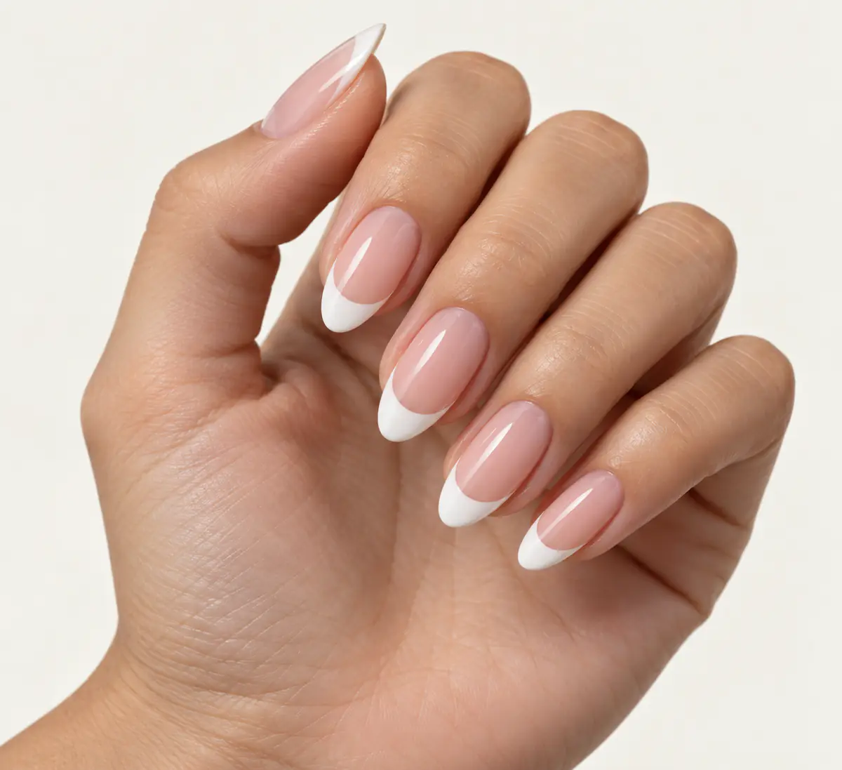 Almond bridal nail style idea with classic white French tips
